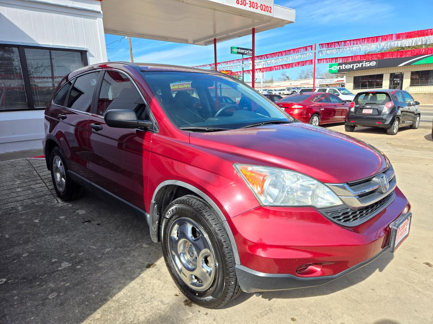 2011 Red Honda CR-V (5J6RE3H34BL) with an 2.4L I4 F DOHC 16V engine, Automatic transmission, located at 503 West Court, Seguin, TX, 78155, (830) 379-3373, 29.568621, -97.969803 - Photo#1